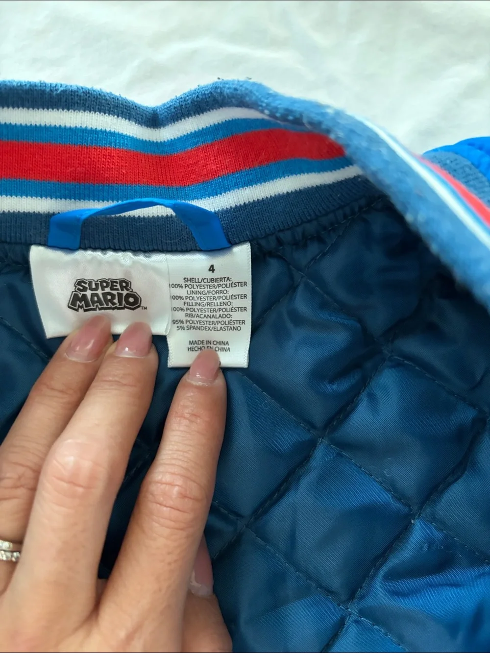 Nintendo Super Mario Blue Quilted Jacket with Red & White Stripes